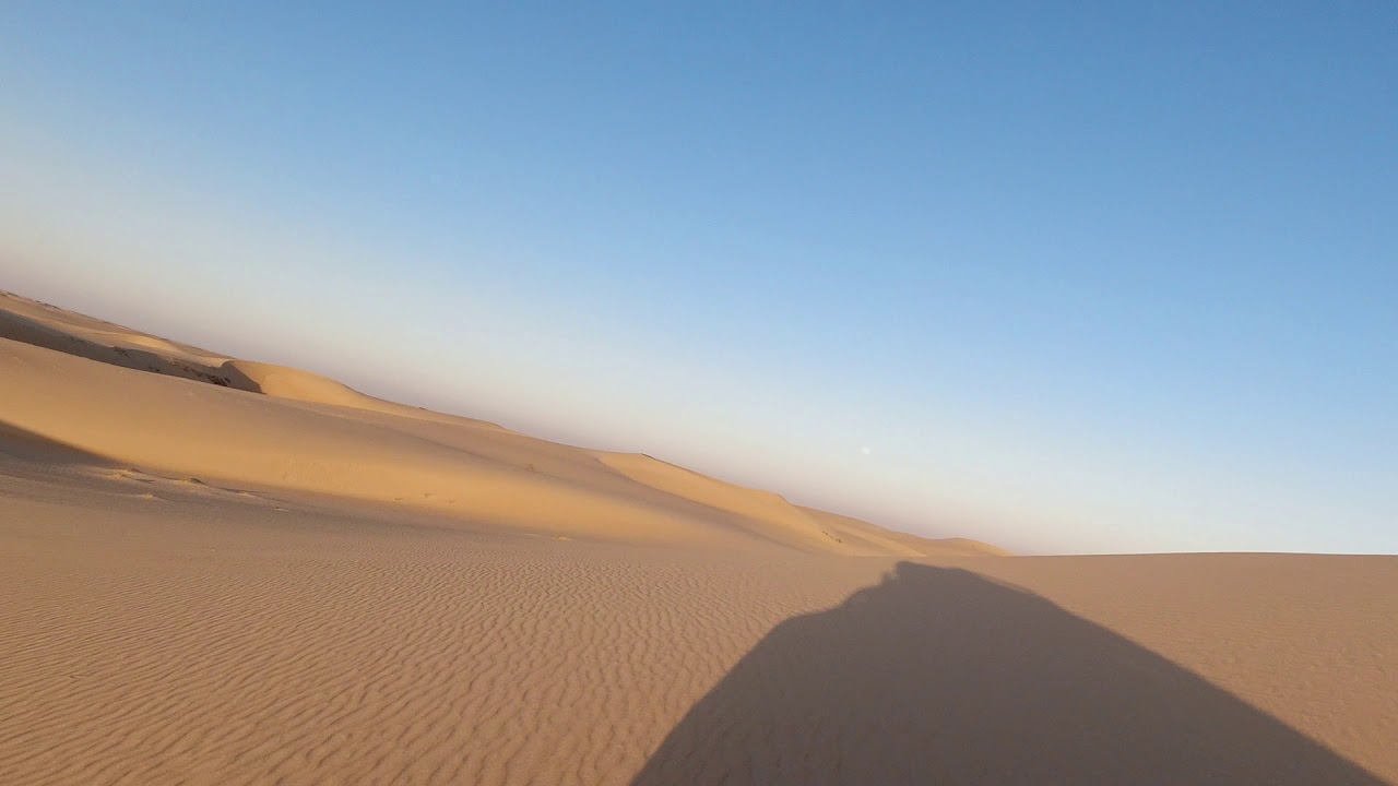 Driving Jafurah Dunes at Sunset