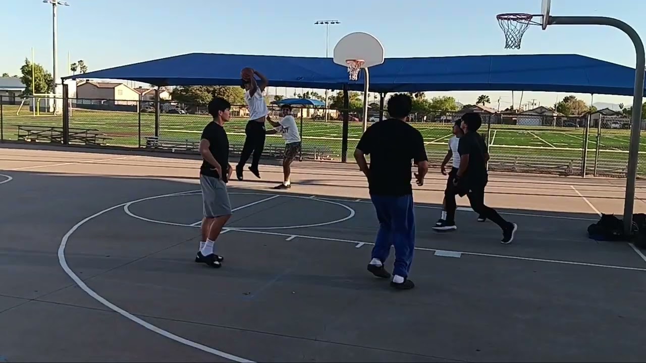 Playing basketball with the football team 