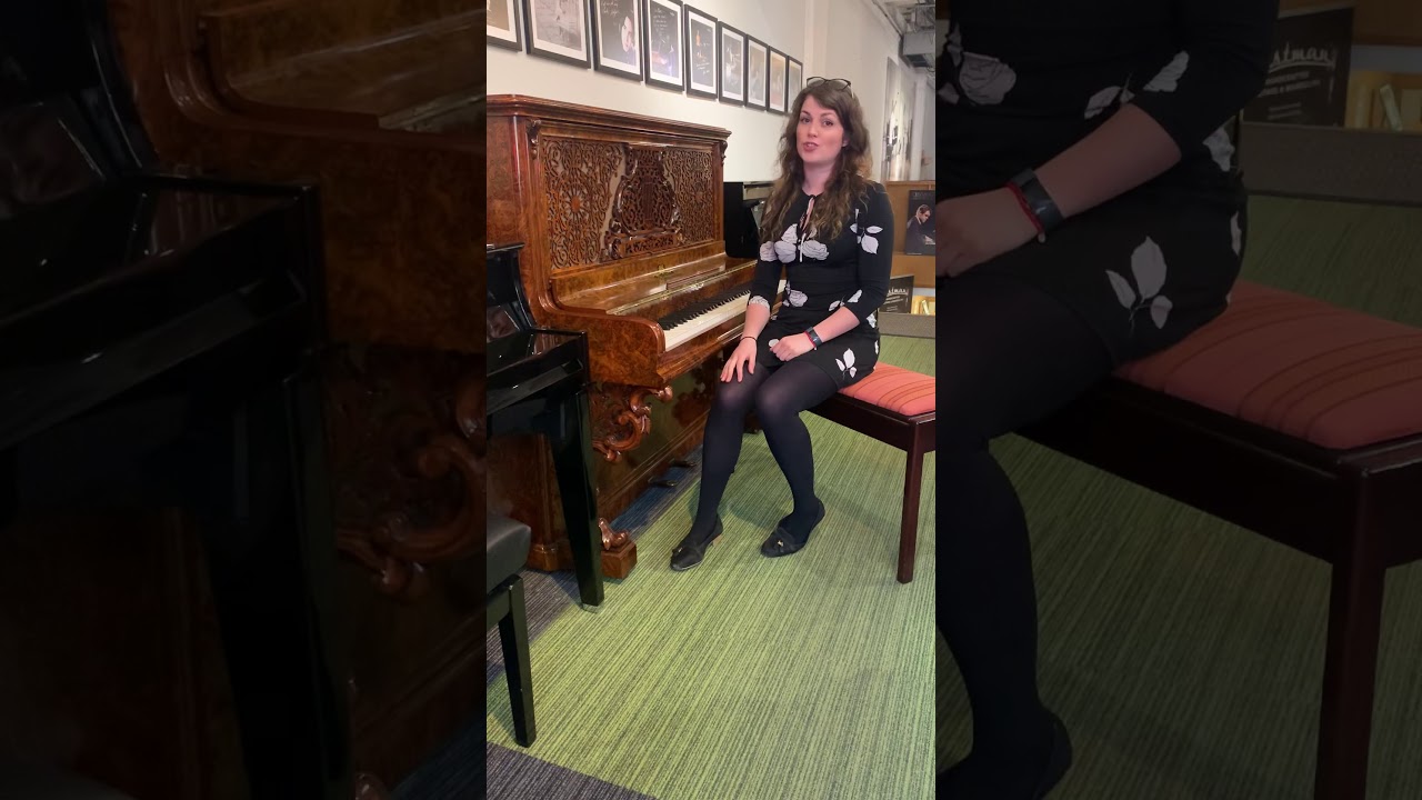 Antique Kirkman upright piano in Burl Walnut french polish with a brand new Wilhelm Schimmel inside