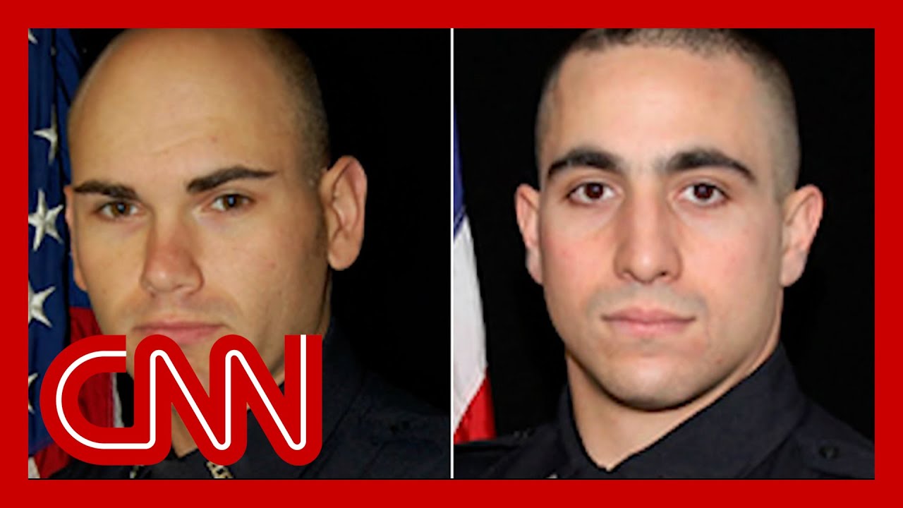 Police say officers were killed after fake 911 call lured them to ambush