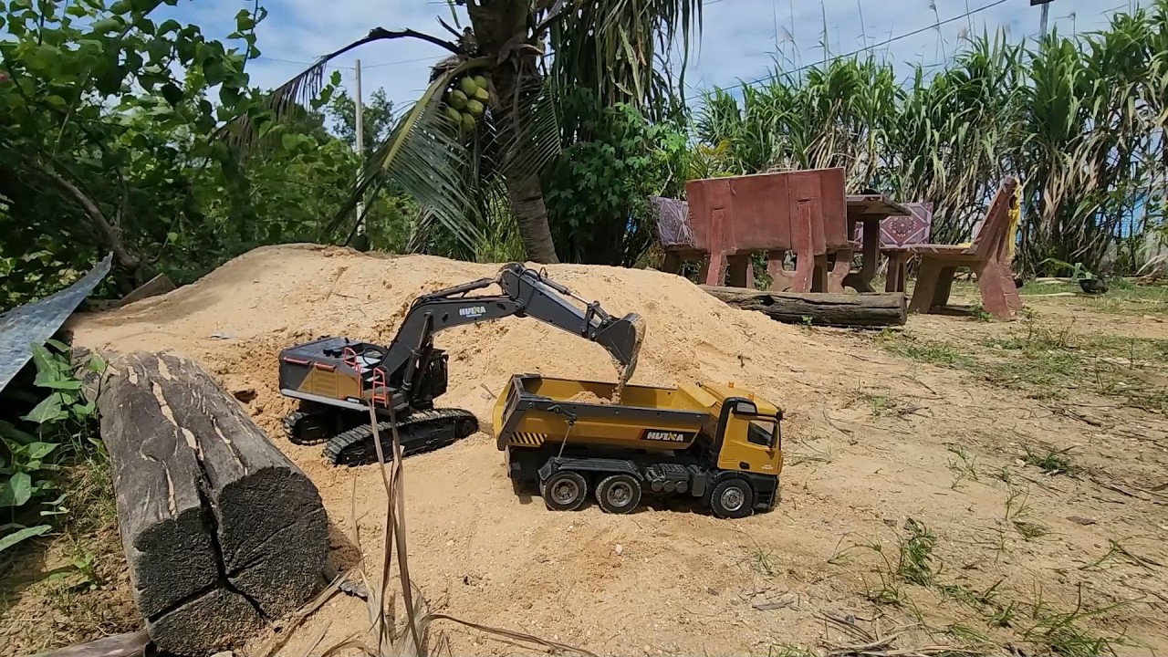 Tropical Worksite: Miniature Heavy Machinery in Action