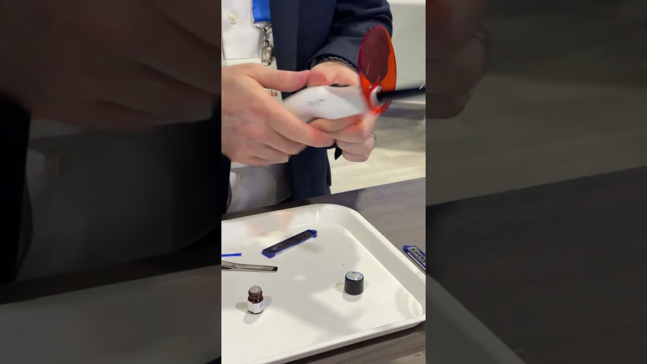 Zach Burkett, Global Product Manager, demos EtchFree Bonding at the Ormco booth