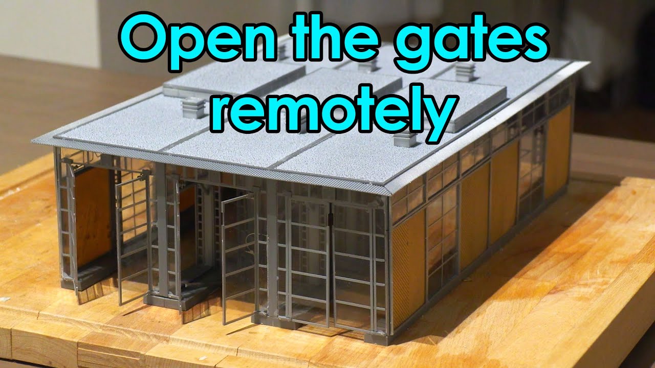 Use servos to operate the gates on the Faller locomotive stall