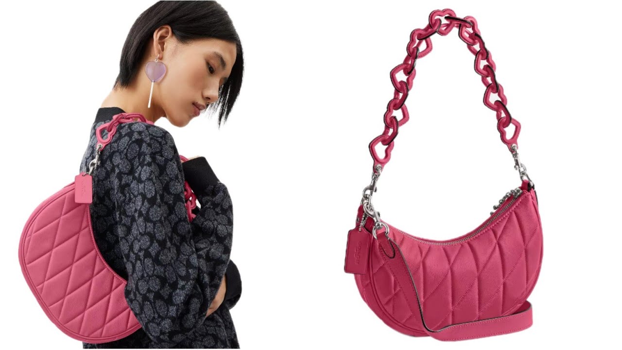 Coach Mira shoulder bag with pillow quilting and heart strap.