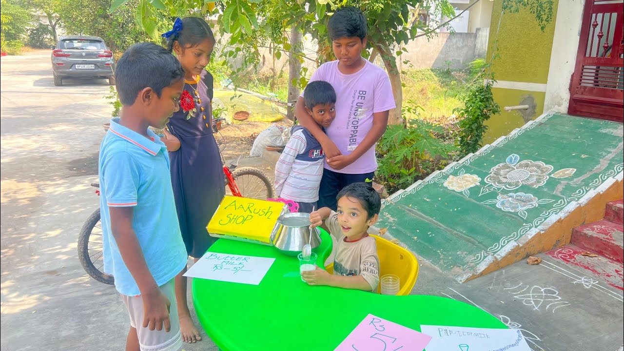 ఐదురూపాయలకుగ్లాస్ రుచికరమైనచిక్కని బటర్ మిల్క్😋 క్వాంటుటీ క్వాలిటీ సుప్పర్ మీరువచ్చేయండి ఆరుష్ షాప్ 