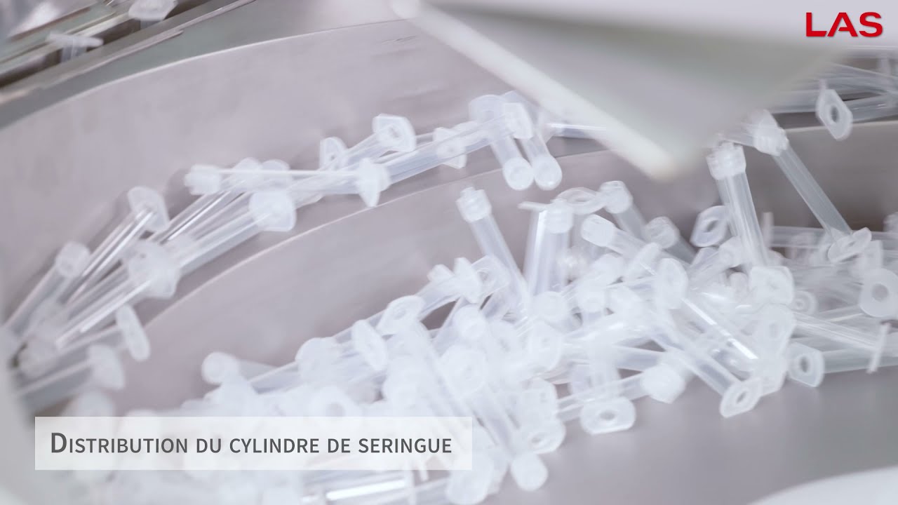 Machine d'assemblage pour seringues