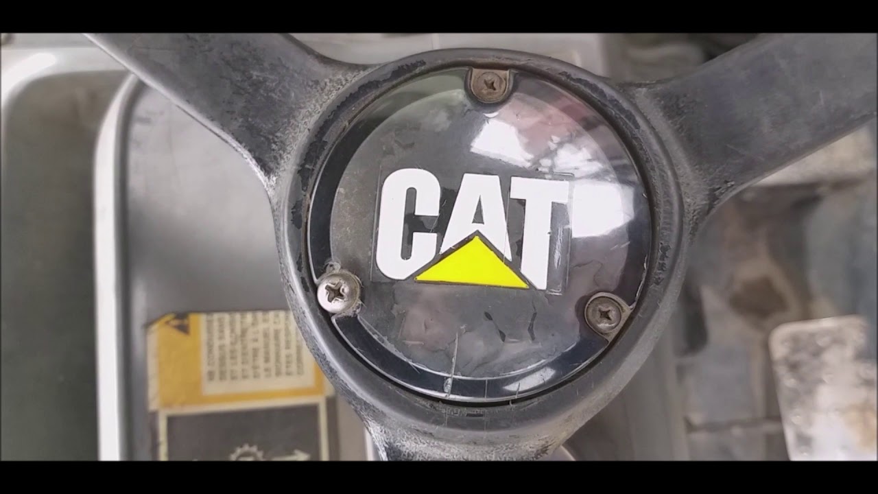 MANDOS DE LA CATERPILLAR 428C 2003 (REVIEW)