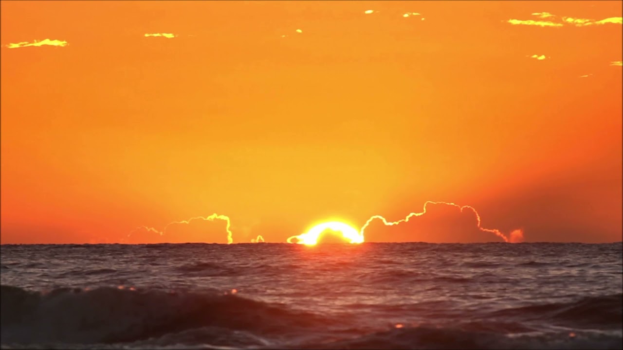 Nascer do Sol no horizonte OCEANO