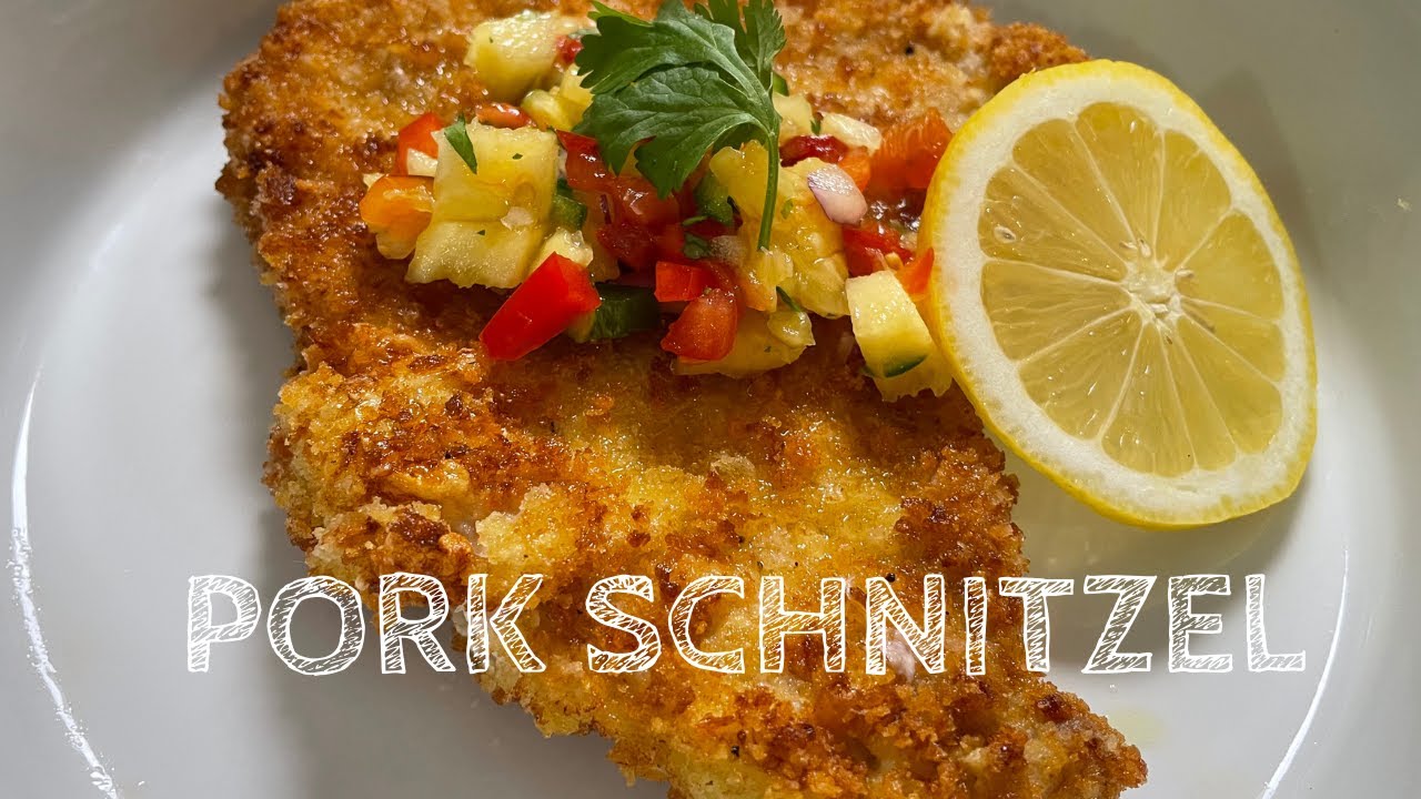 GERMAN STYLE  PORK SCHNITZEL SERVED WITH CARIBBEAN STYLE SALSA