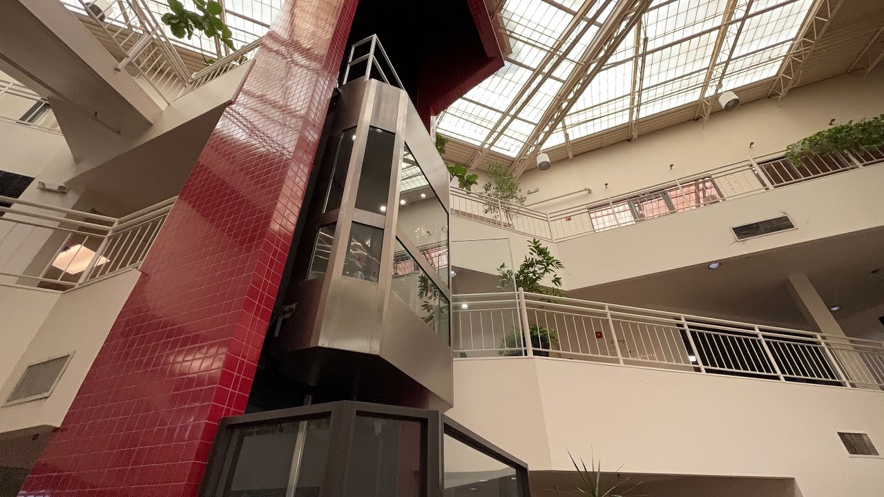 Denver's Campbell Court: Shops at Cherry Creek with Epic glass elevator and broken Escalator