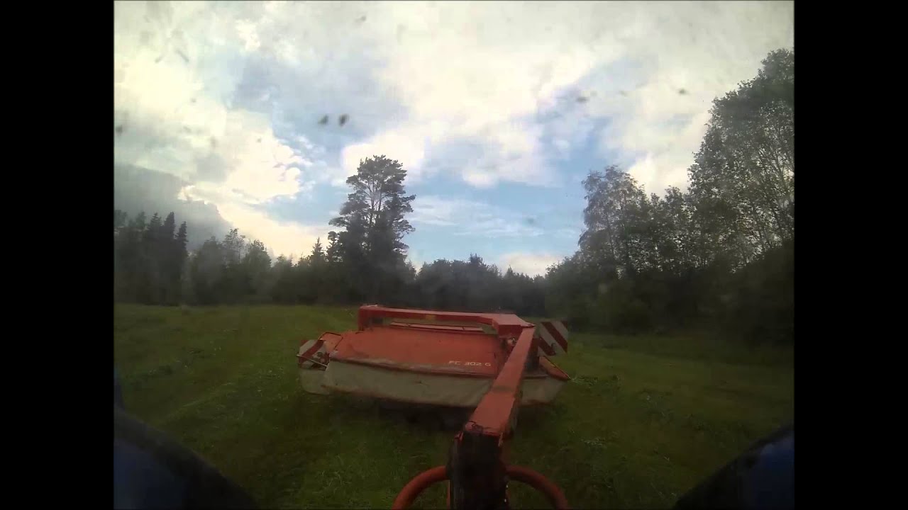 Valtra C150 mowing with Kuhn fc 302