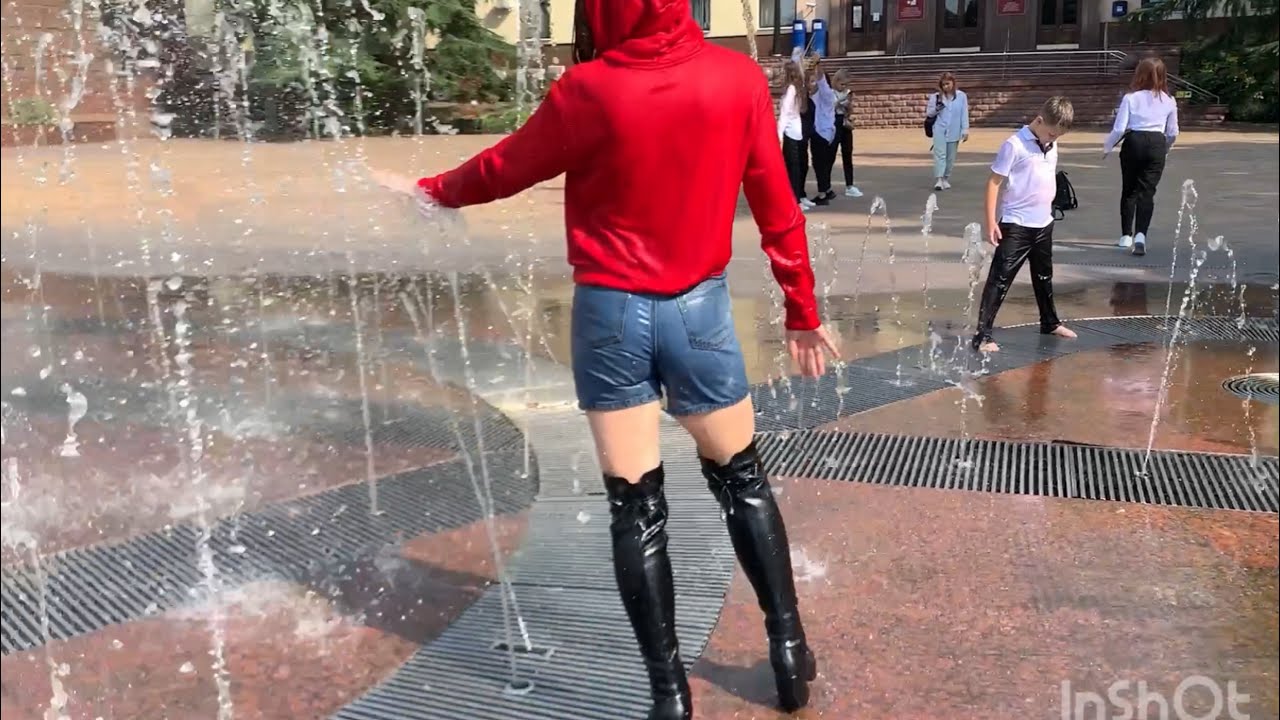 red jacket with jackboots #girls #wet #fountain