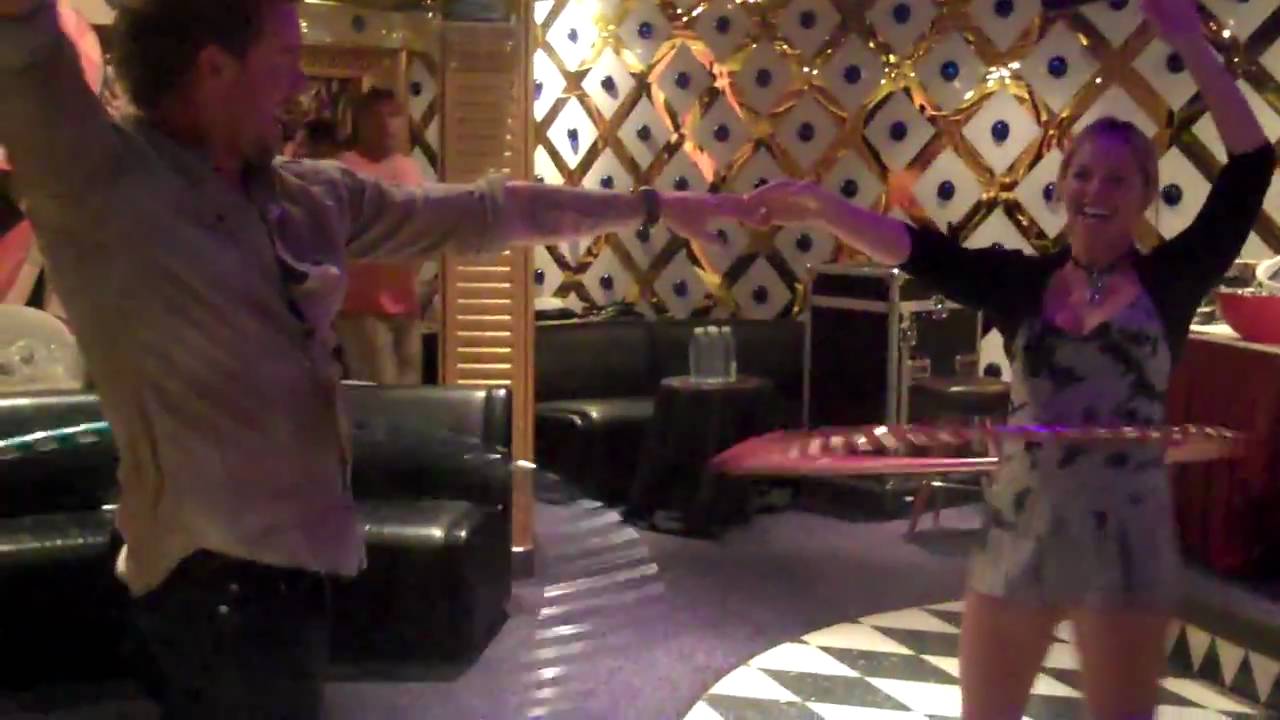 Cmartrocks with the drummer of Train hula hooping backstage on VH1 Cruise