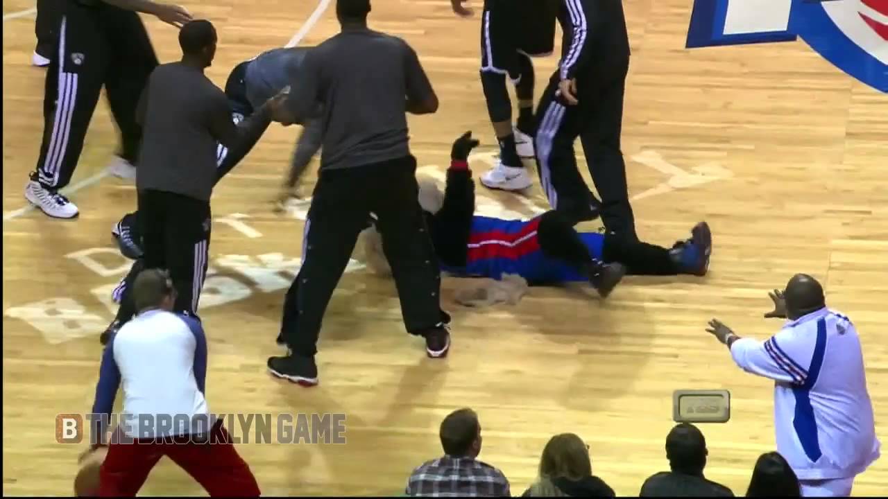 Funny: Nets Players Jump Pistons Mascot