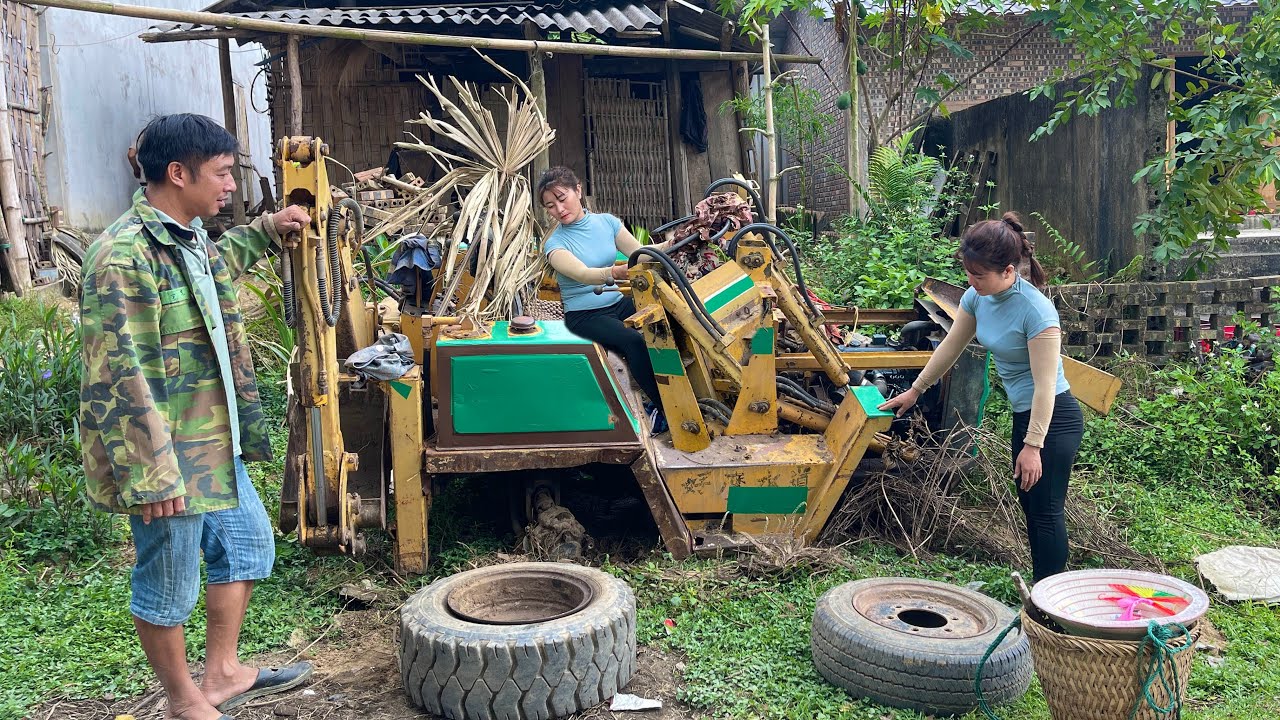 The girl restored the farm machine that her brother left at the old house.