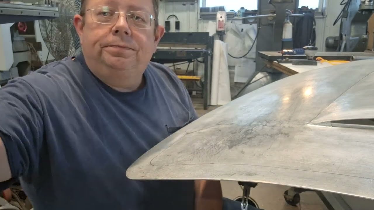 The Ox planishing hammer with Imperial wheeling machine body dollies.