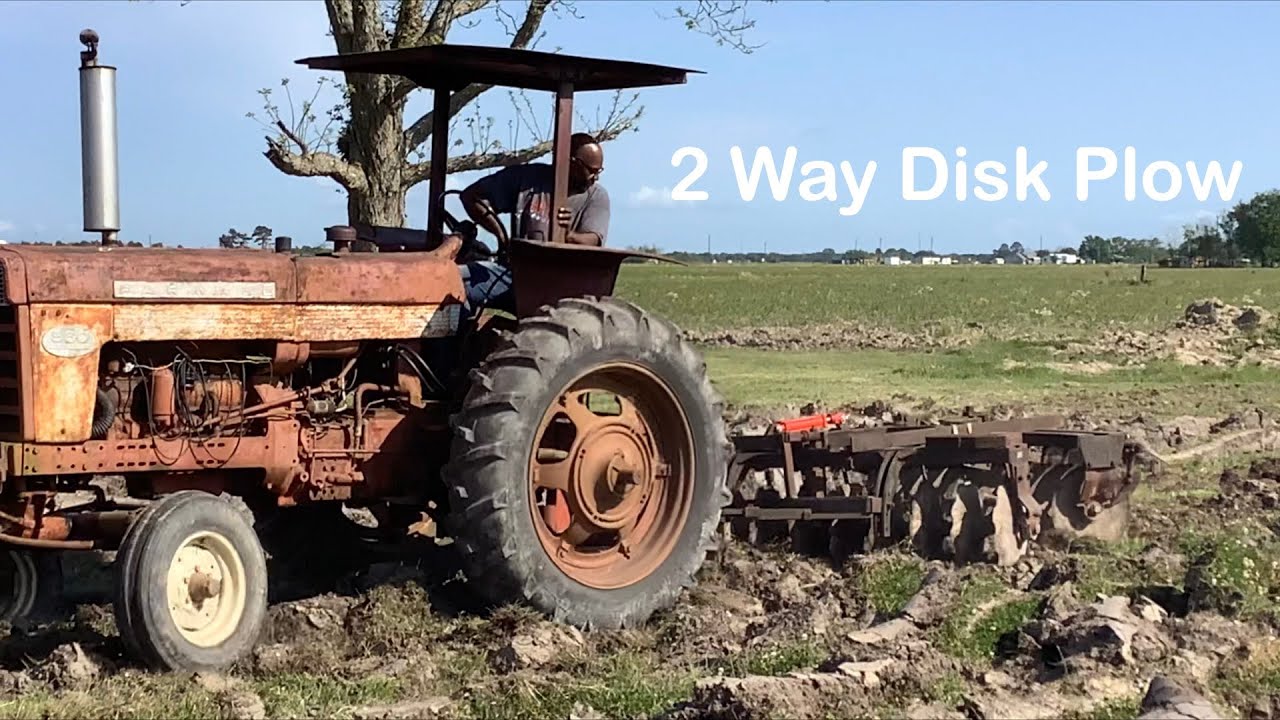 Soil Prep On A Farmall Tractor and a 2 Way Disk Plow