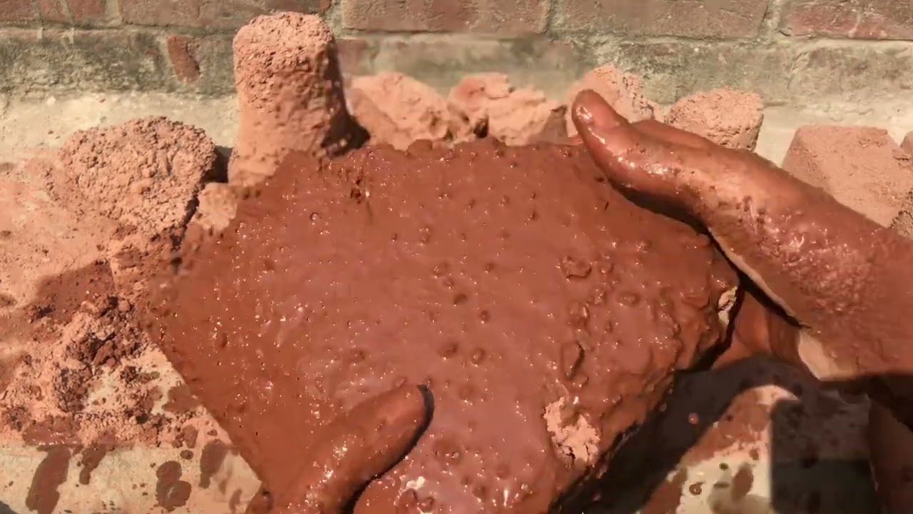 Stony red dirt dry crumbling dry floor crumbling clay pot crumbling dipping paste pouring