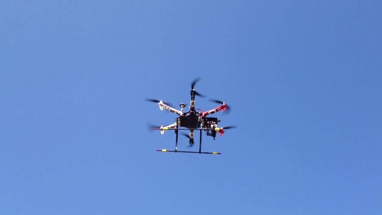 DJI hex F550 flamewheel with brushless gimbal taking off for a mission
