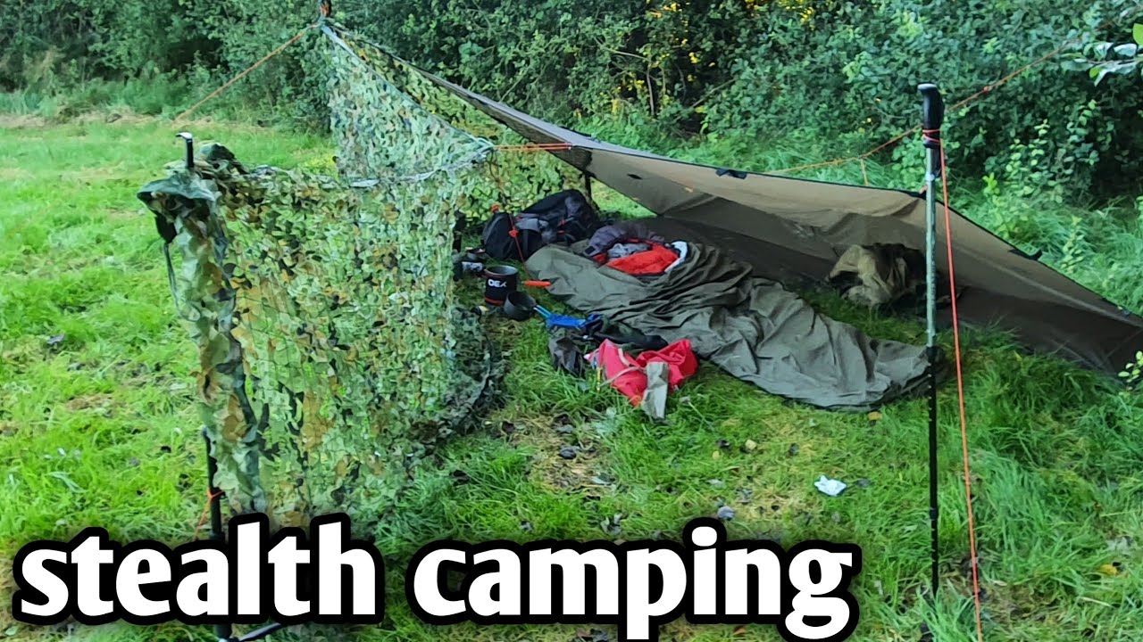 stealth camping, wild camping using oex bivvi bag and oex tarp with  camouflage net