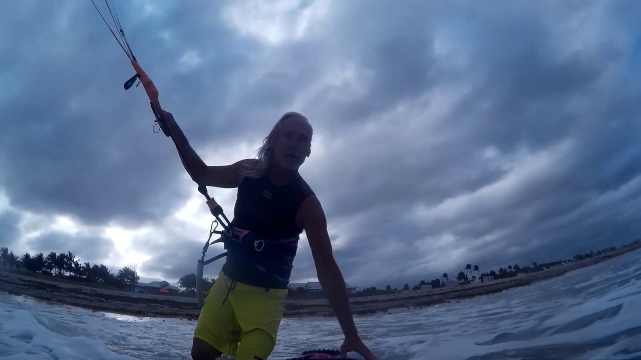 Cute girl finds my GoPro camera in the surf!