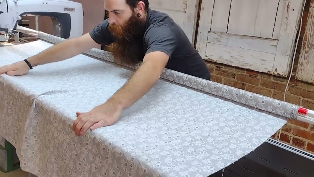 Loading a quilt on a @TheGraceCompany Quilters Evolution Elite frame. Part 1