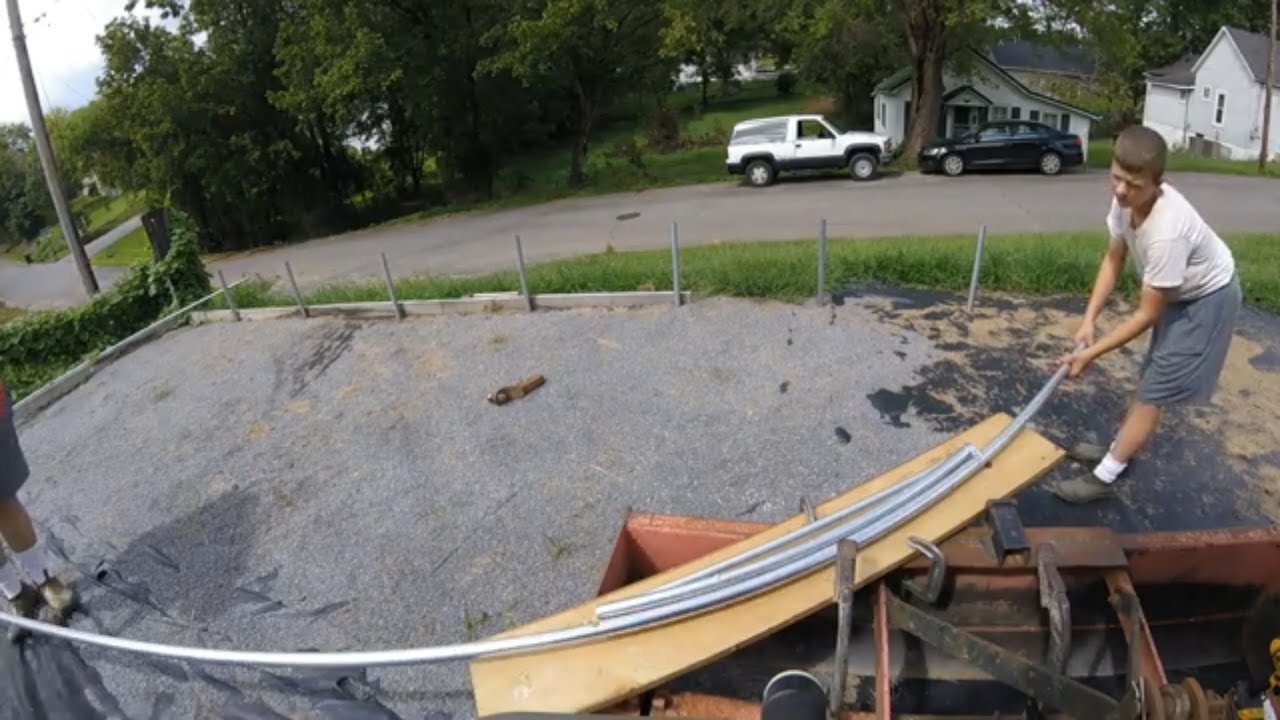 Bending the Bows for our Bootstrap Farmer DIY Greenhouse Kit