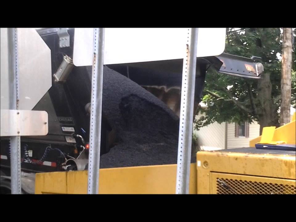 Live Bottom Trailer Asphalt paving under trees
