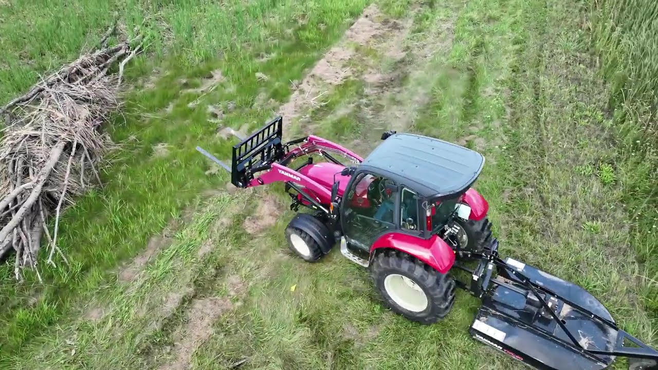 Take a look at the Yanmar YT347 47hp tractor with forks and brush hog, from Martins outdoor Power.