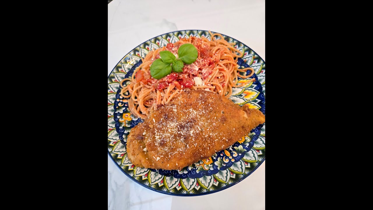Romano crusted chicken with spaghetti