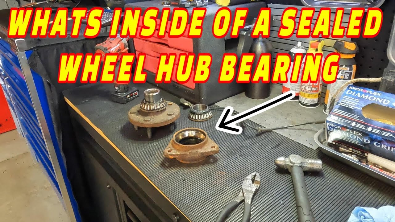 WHATS INSIDE OF A FORD WHEEL HUB BEARING! LET'S TEAR IT DOWN AND SEE WHATS INSIDE!