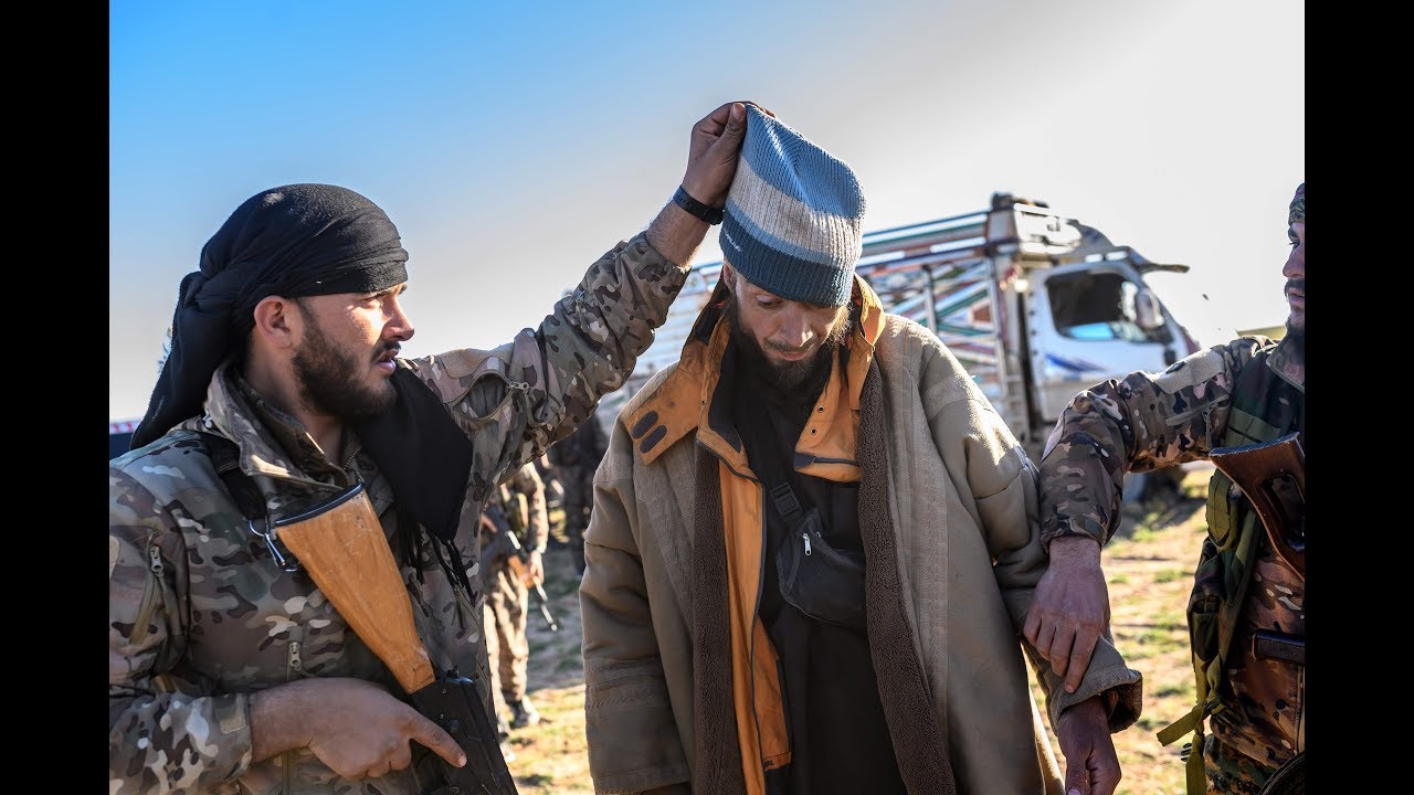Suspected ISIS members surrender to US-backed SDF forces near Baghouz