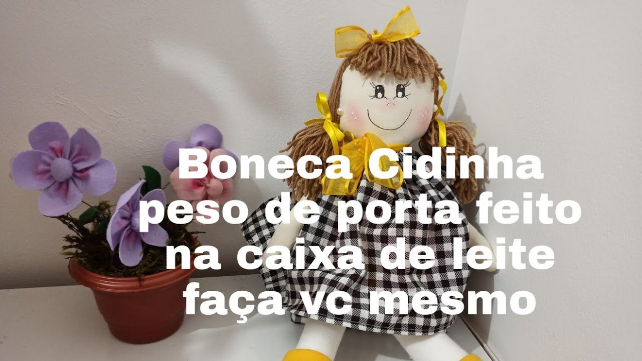 Boneca peso de porta  feita com caixa de leite fácil de mais