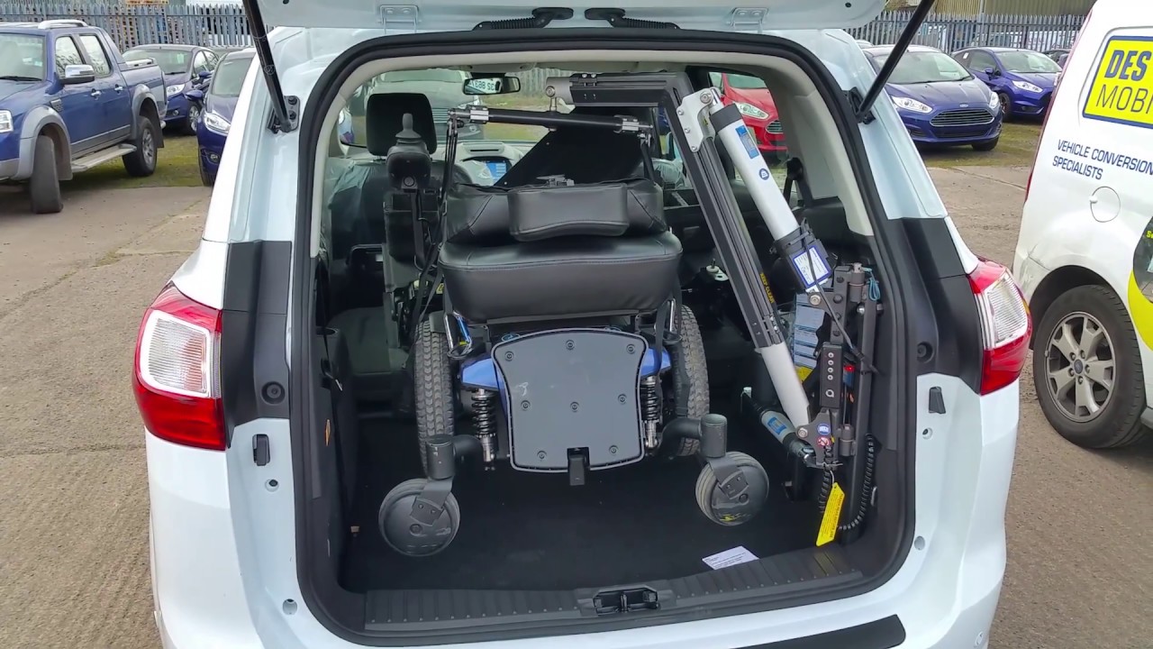 Olympian Hoist loading Jazzy 600es into Grand C-Max