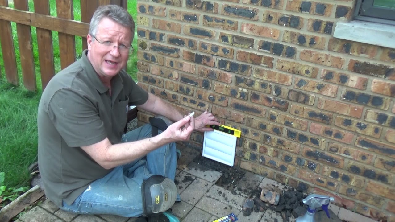 Installing an EZ Breathe Crawlspace Ventilation System Through a Brick Exterior