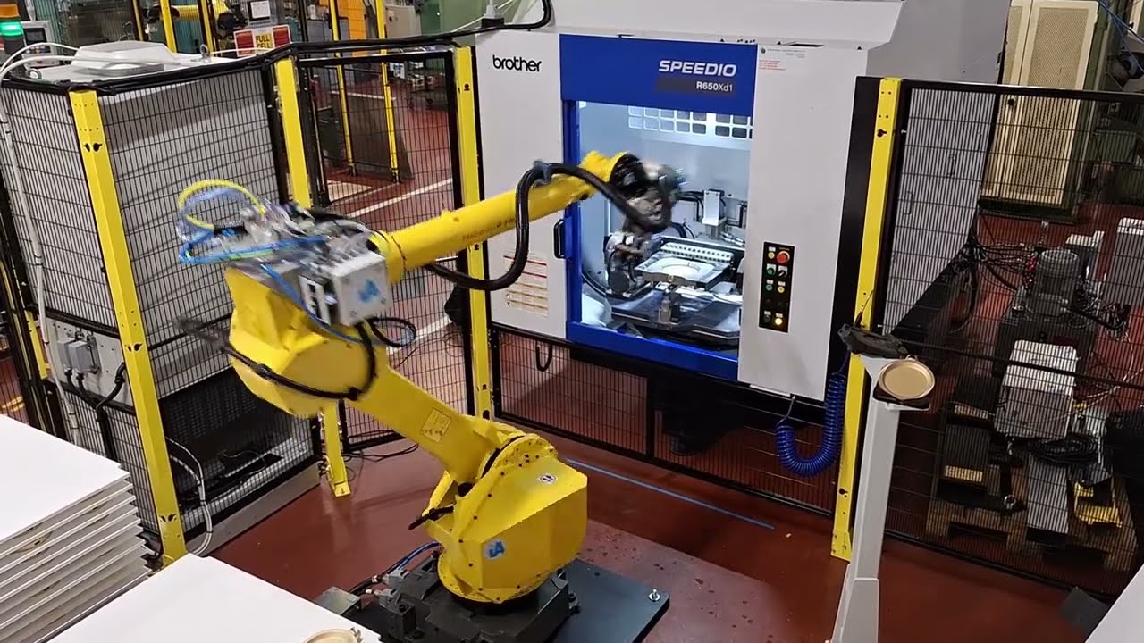 Automazione macchina utensile CNC Brother con sistema di visione e robot Fanuc