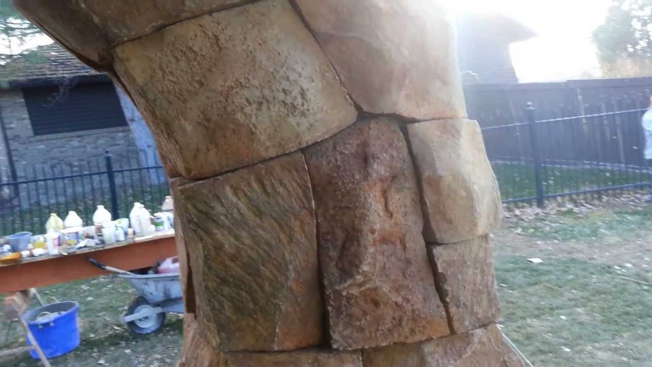 vertical concrete carving, stone carving, outdoor