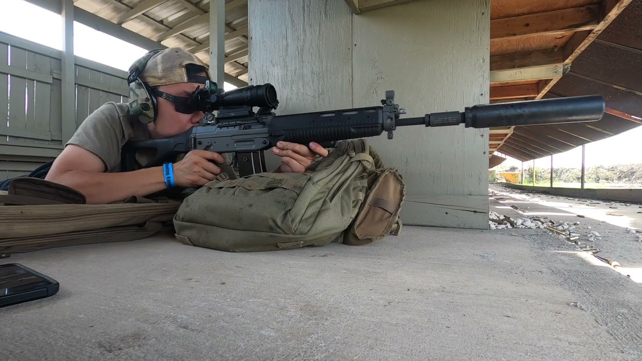 SWISS SIG551 Shooting Suppressed