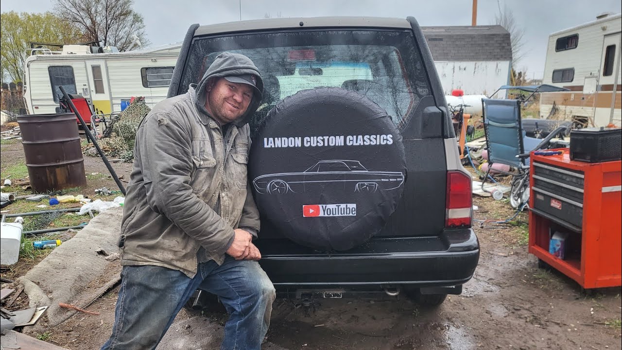 Changing 96 Geo Tracker wheel bearings and brakes in the rain!
