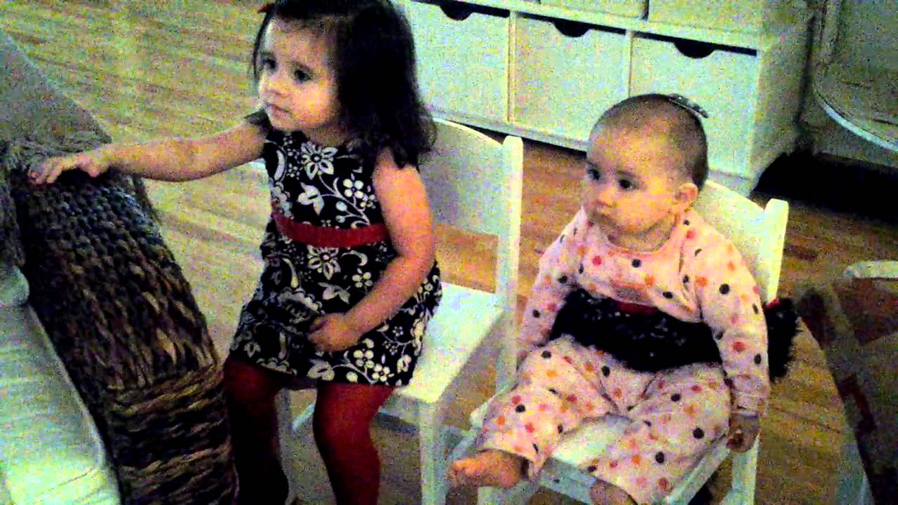 Sisters watch baby einstein
