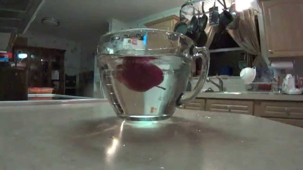 Apple dropped into bowl of water slow motion Sony Action Cam