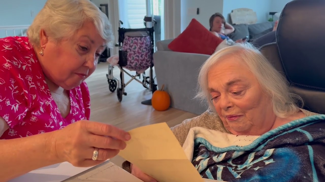 Mom opening sister Ann & brother Bill’s birthday gift.  2025