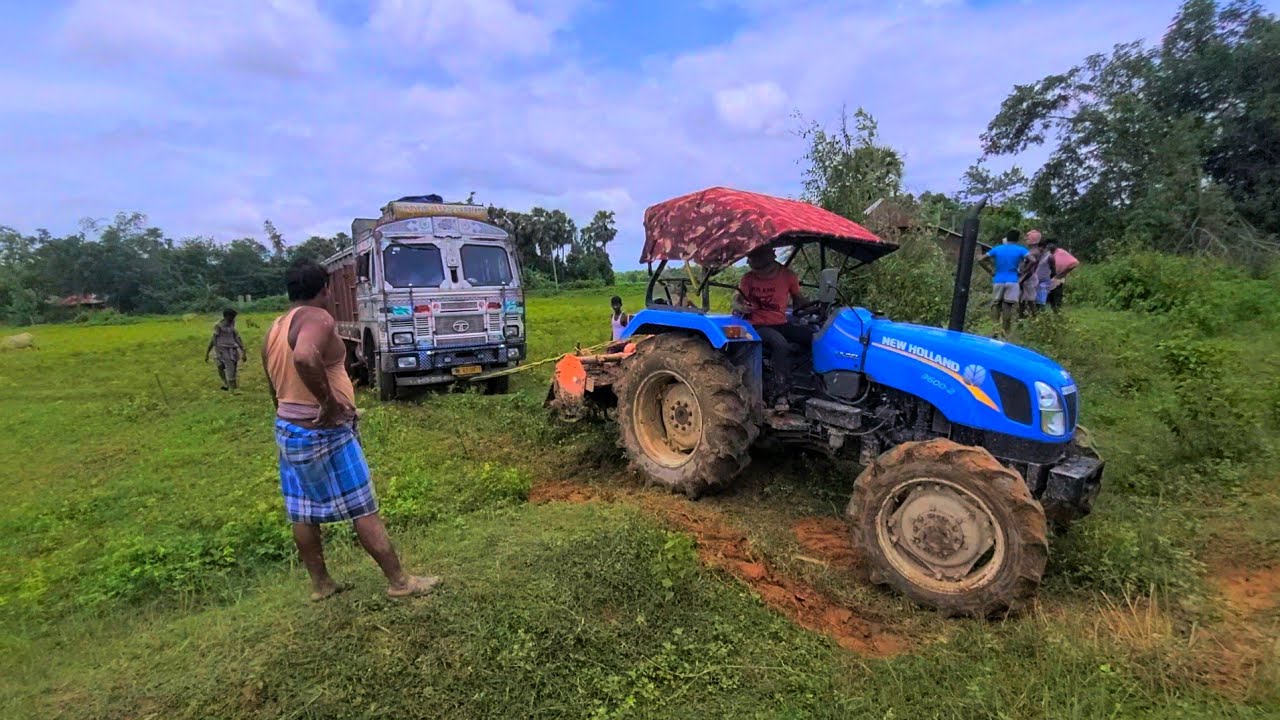 Tata 10 wheeler truck stuck on deep mud | Recovering by New Holland 3600-2 4wd excel tractor #viral