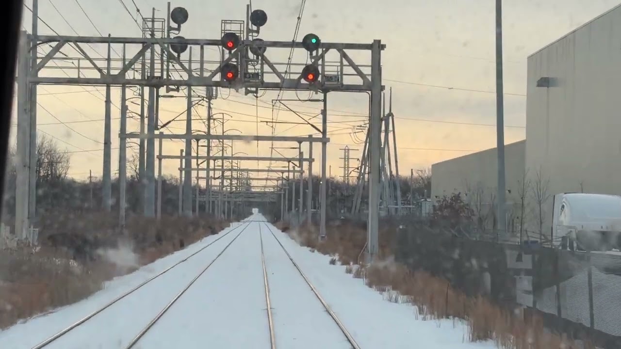 Philadelphia Airport bound SEPTA train snowstorm 2026 storm Fern rail fan window.  