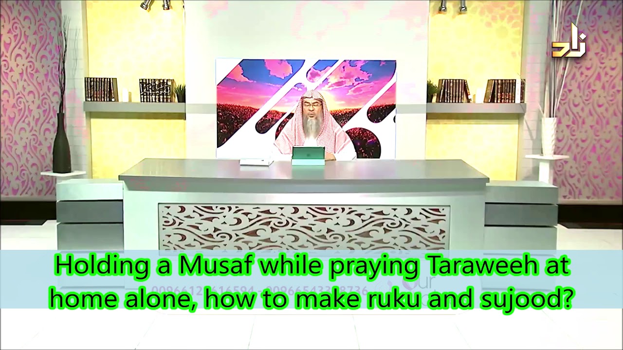Holding the Quran while praying taraweeh and how to do ruku and sujood? - Assim al hakeem