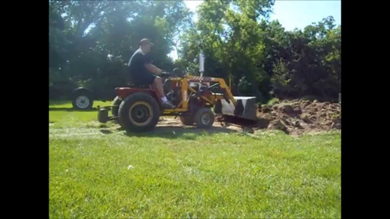 MTD 990 with Johnson Loader - Playin' in the dirt