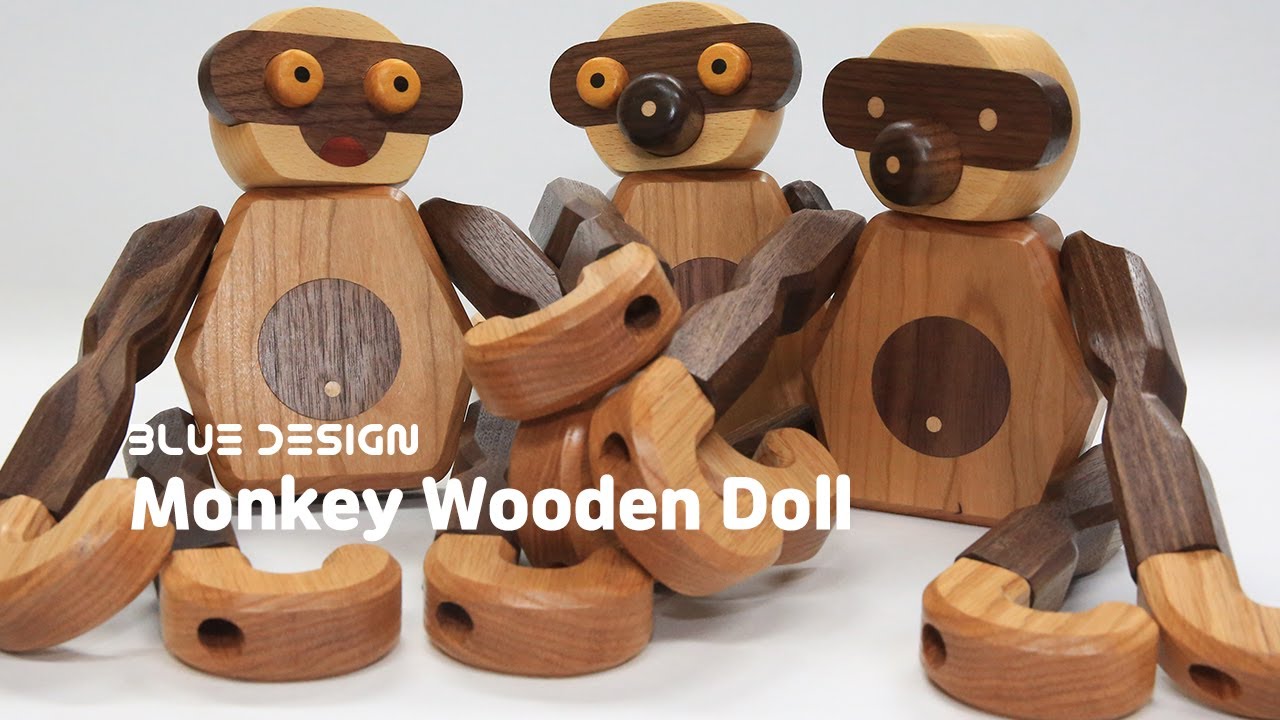 Making three monkey wooden dolls