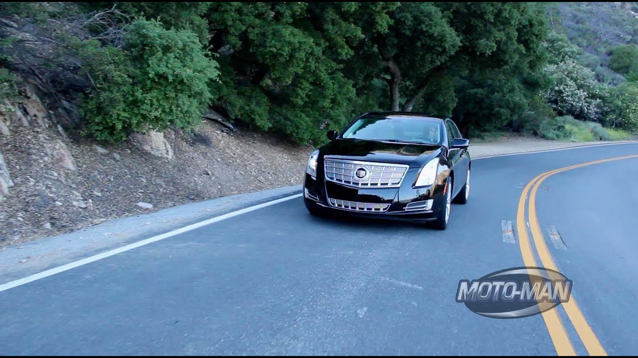 Cadillac XTS 2013 with Cadillac VP of Marketing Don Butler