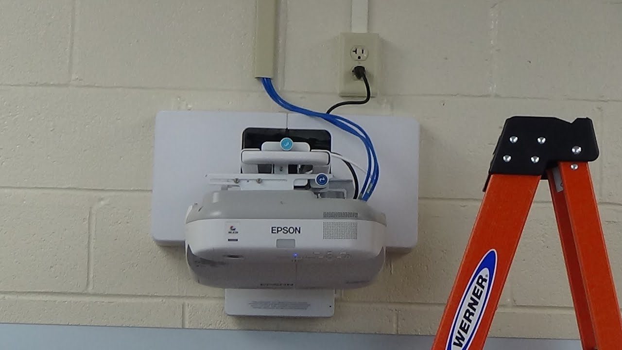 Wired Communications installing CAT 6 cable & projectors for school classrooms