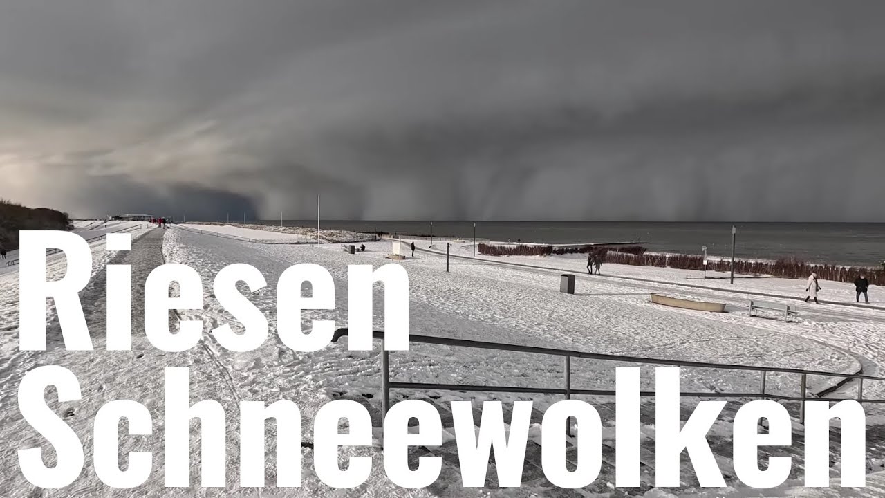 Cuxhaven: riesige Schneewolken ziehen über das Meer